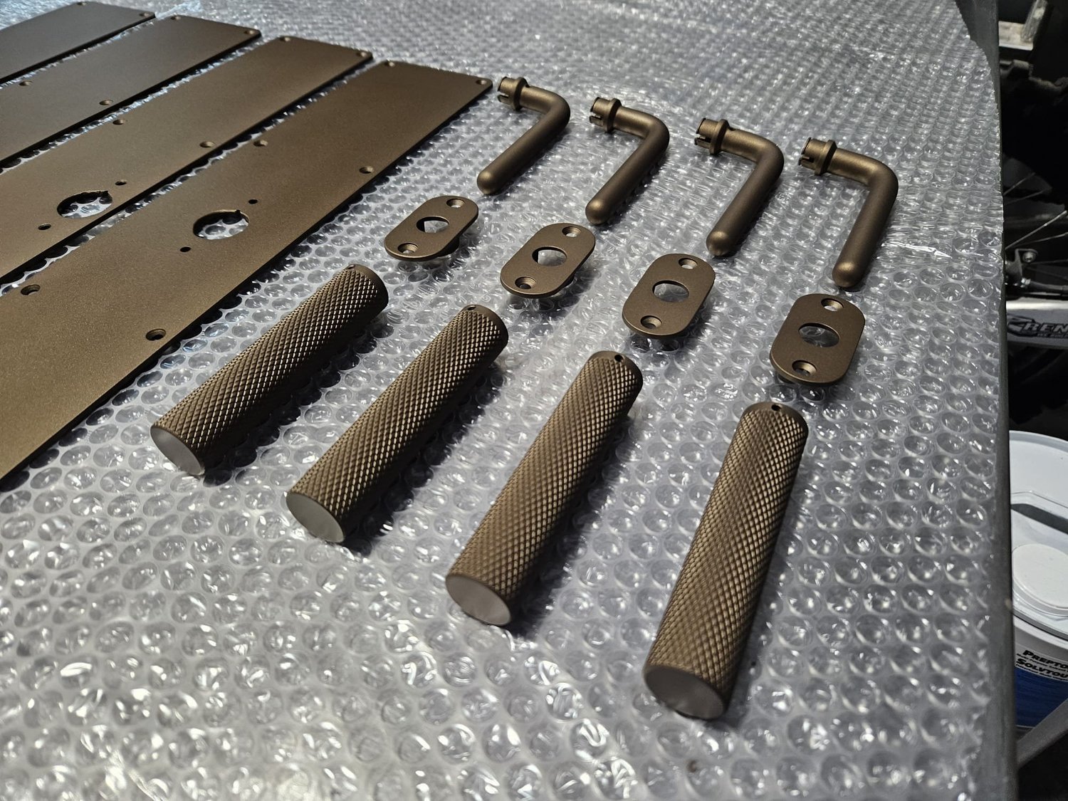 Cerakote-coated architectural door handles and fittings